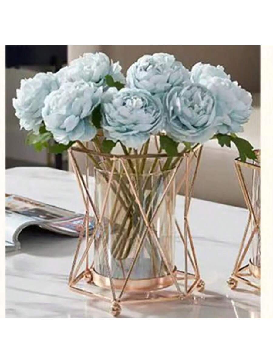 gold metal flower vase