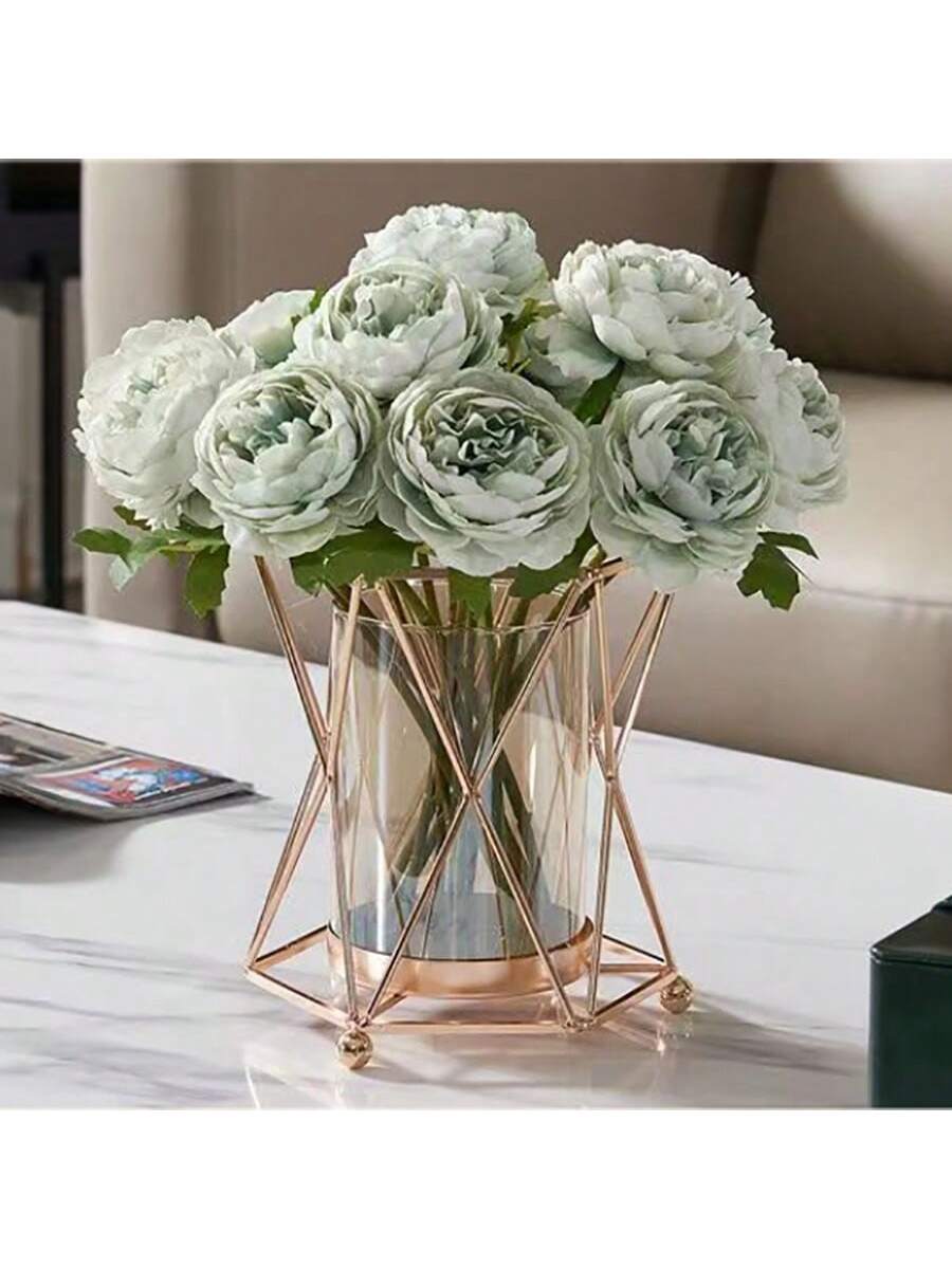 gold metal flower vase