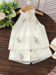 white embroidered top​

