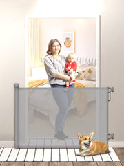 Retractable stair gate