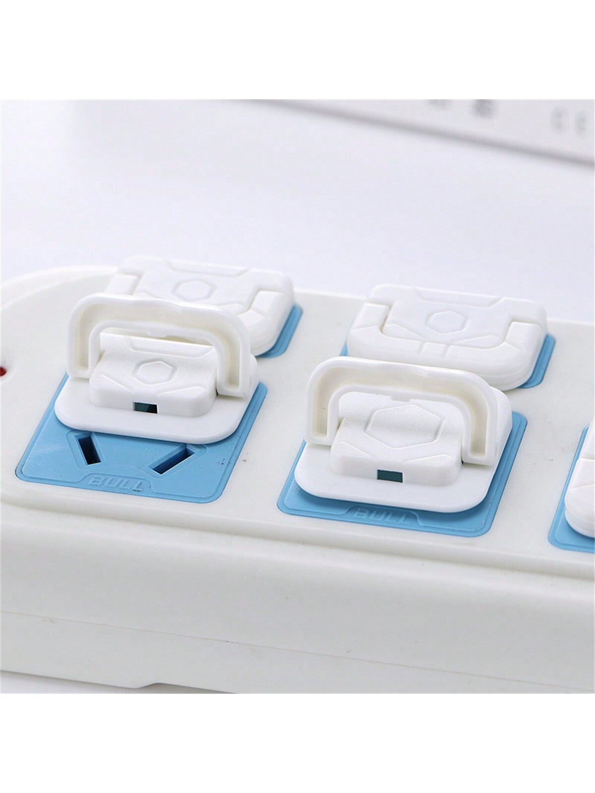 Mains socket cover